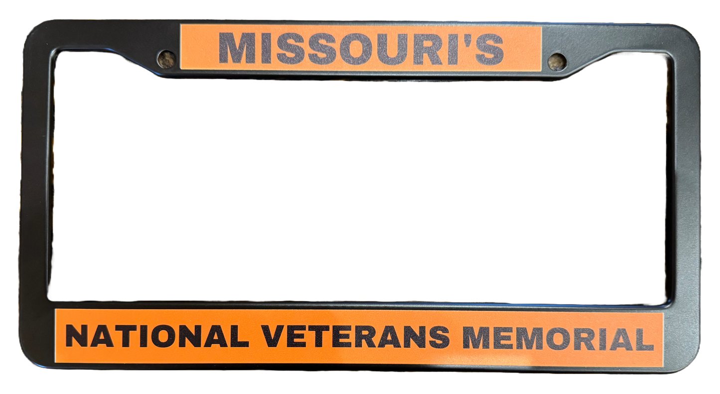 License plate from with the words Missouri's National Veterans Memorial. Black and orange